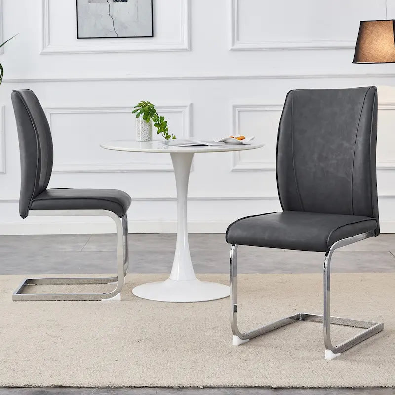 Chaise de salle à manger moderne capitonnée, dossier arqué en cuir PU, pieds cantilever chromés gris