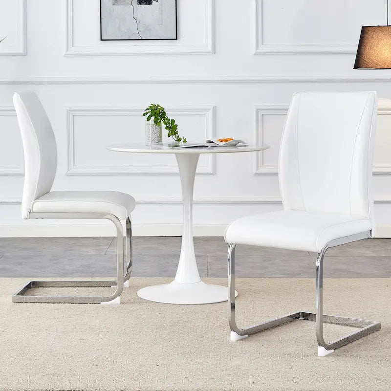 Chaise de salle à manger moderne capitonnée, dossier arqué en cuir PU, pieds cantilever chromés gris