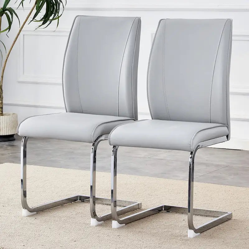 Chaise de salle à manger moderne capitonnée, dossier arqué en cuir PU, pieds cantilever chromés gris