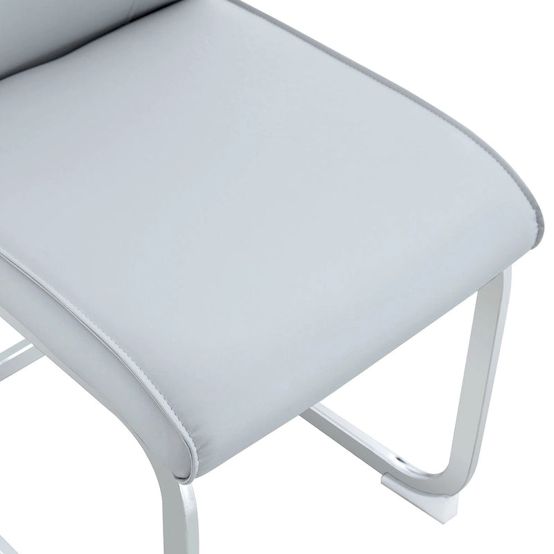 Chaise de salle à manger moderne capitonnée, dossier arqué en cuir PU, pieds cantilever chromés gris