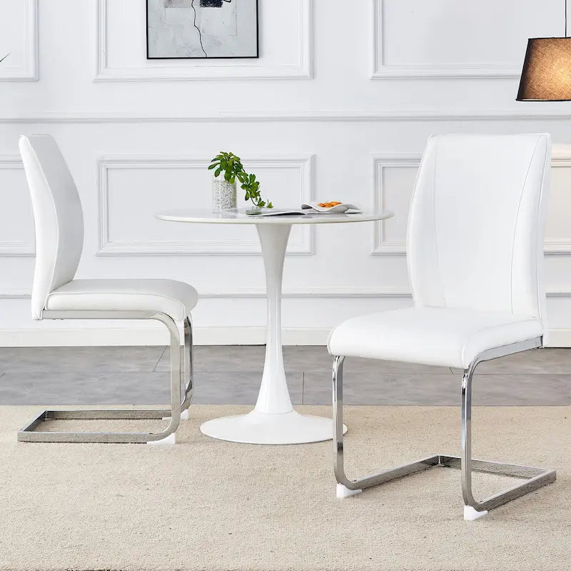 Chaise de salle à manger moderne capitonnée, dossier arqué en cuir PU, pieds cantilever chromés gris