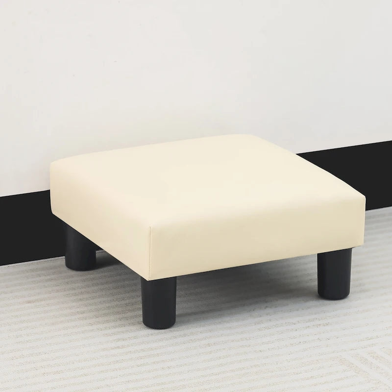 Petit pouf rembourré carré avec pieds noirs en tissu gris