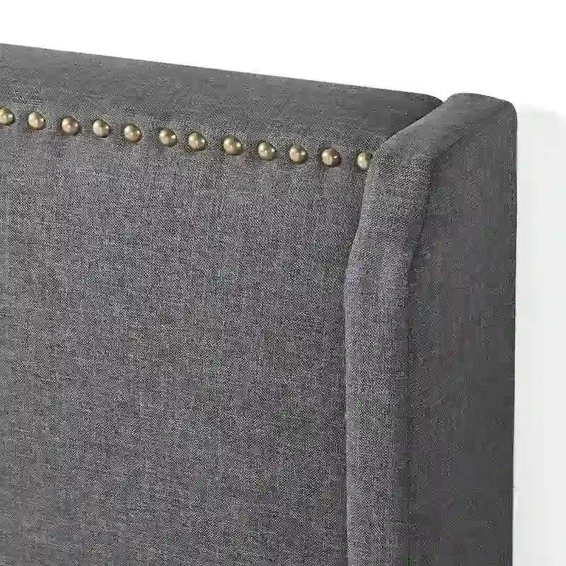 Lit plateforme capitonné à oreilles gris foncé avec clous de tapissier